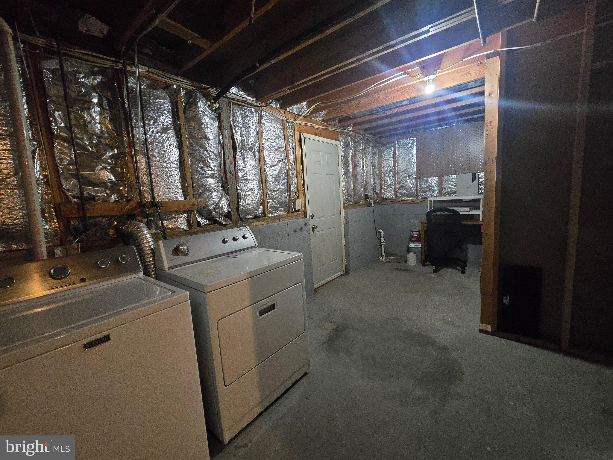 5040 Clifford Road, Unit 5040 Perry Hall, MD 21128 - Photo 19 of 19 a utility room with dryer and washer
