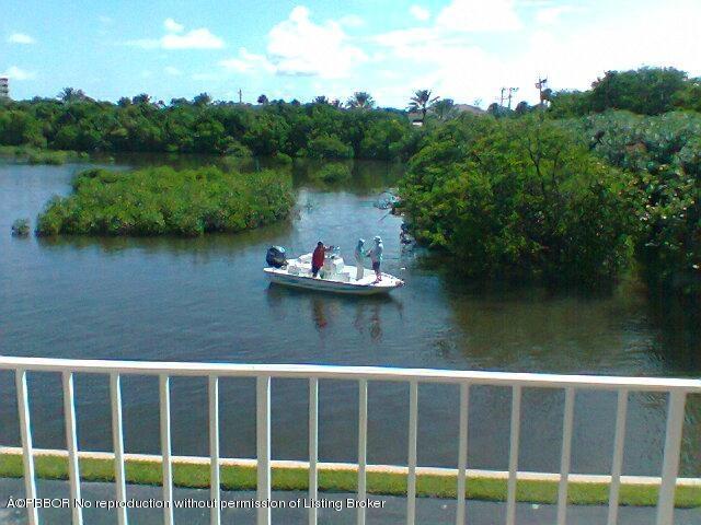 2195 Ibis Isle Road, Unit 5 Palm Beach, FL 33480 - Photo 2 of 12 a view of a lake