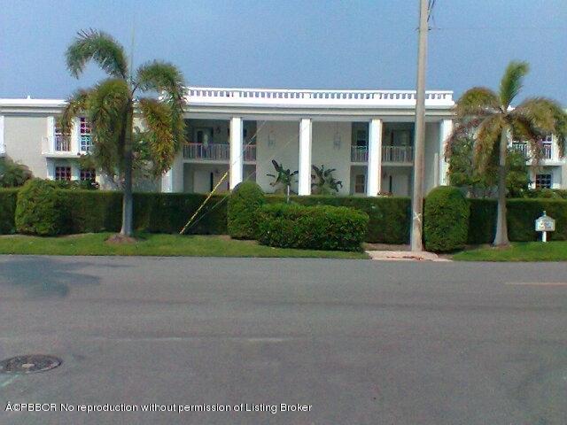 2195 Ibis Isle Road, Unit 5 Palm Beach, FL 33480 - Photo 5 of 12 a view of a house with a yard