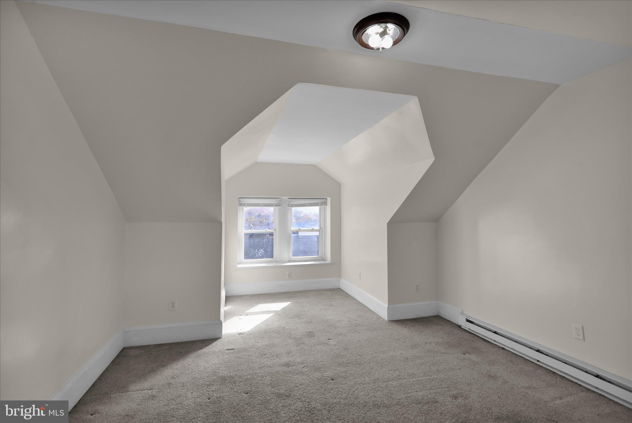 715 Mount Laurel Road Temple, PA 19560 - Photo 20 of 24 an empty room with windows and entrance