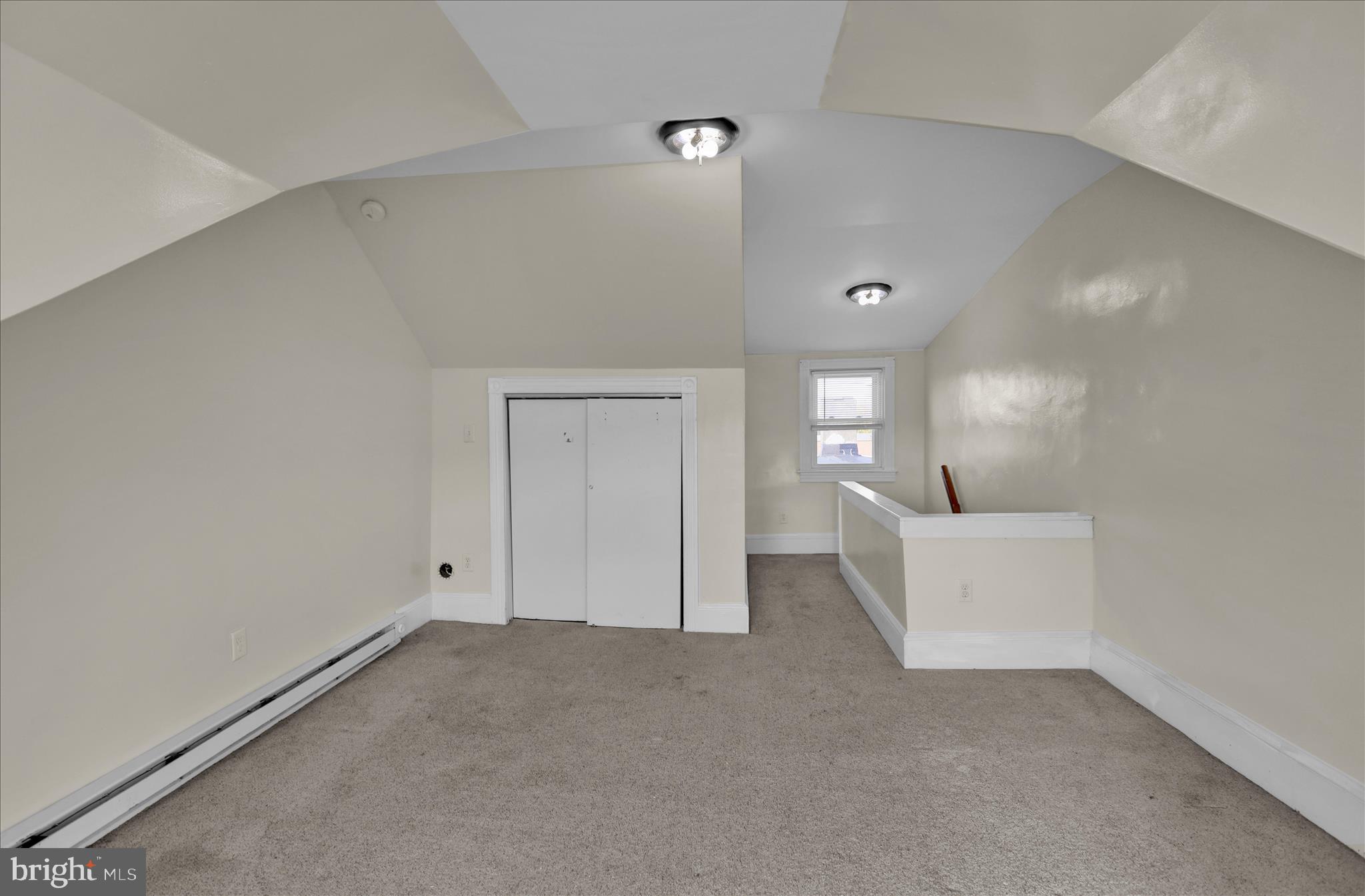 715 Mount Laurel Road Temple, PA 19560 - Photo 21 of 24 a view of an empty room and a window