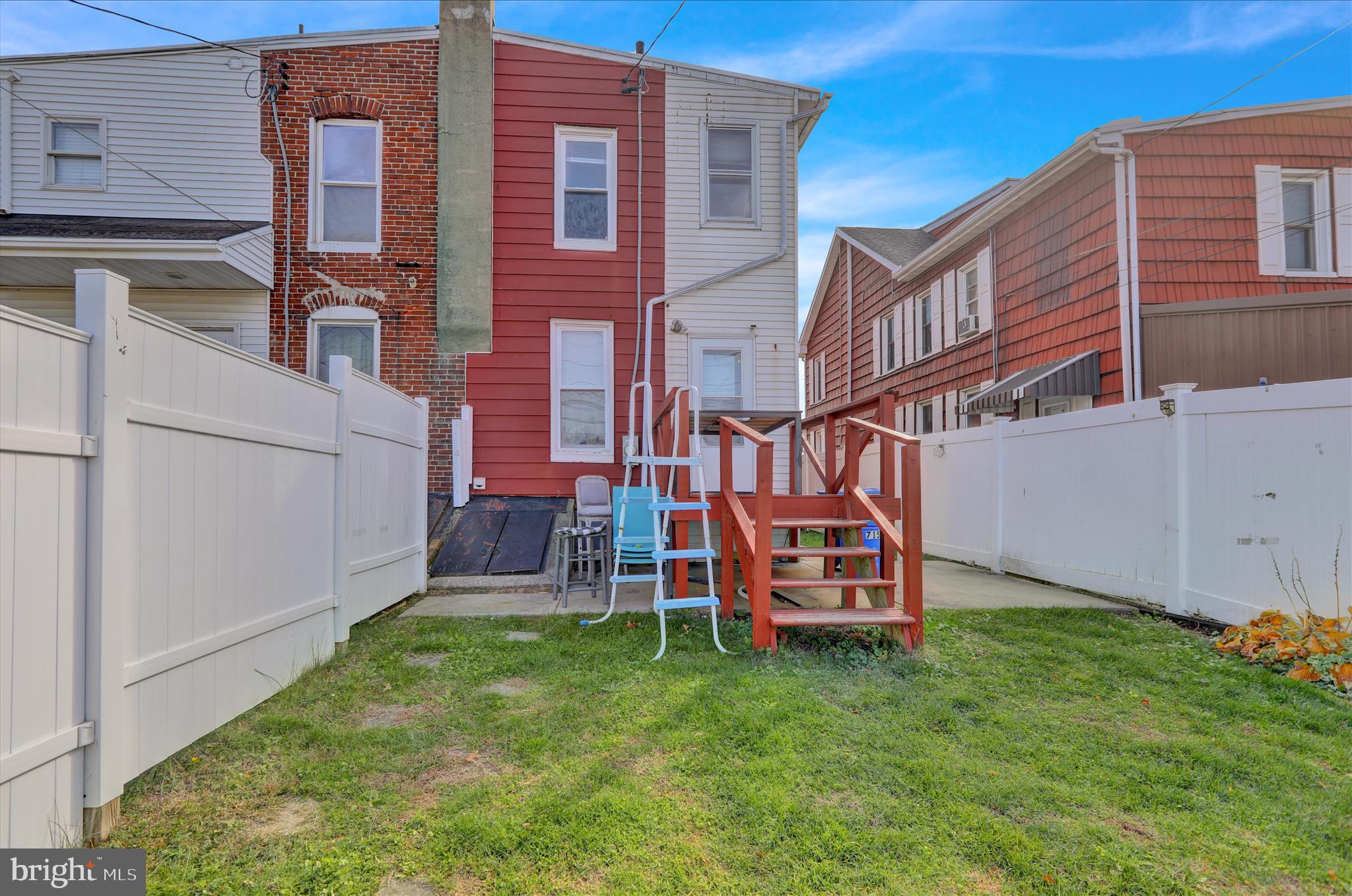 715 Mount Laurel Road Temple, PA 19560 - Photo 23 of 24 front view of a house with a yard