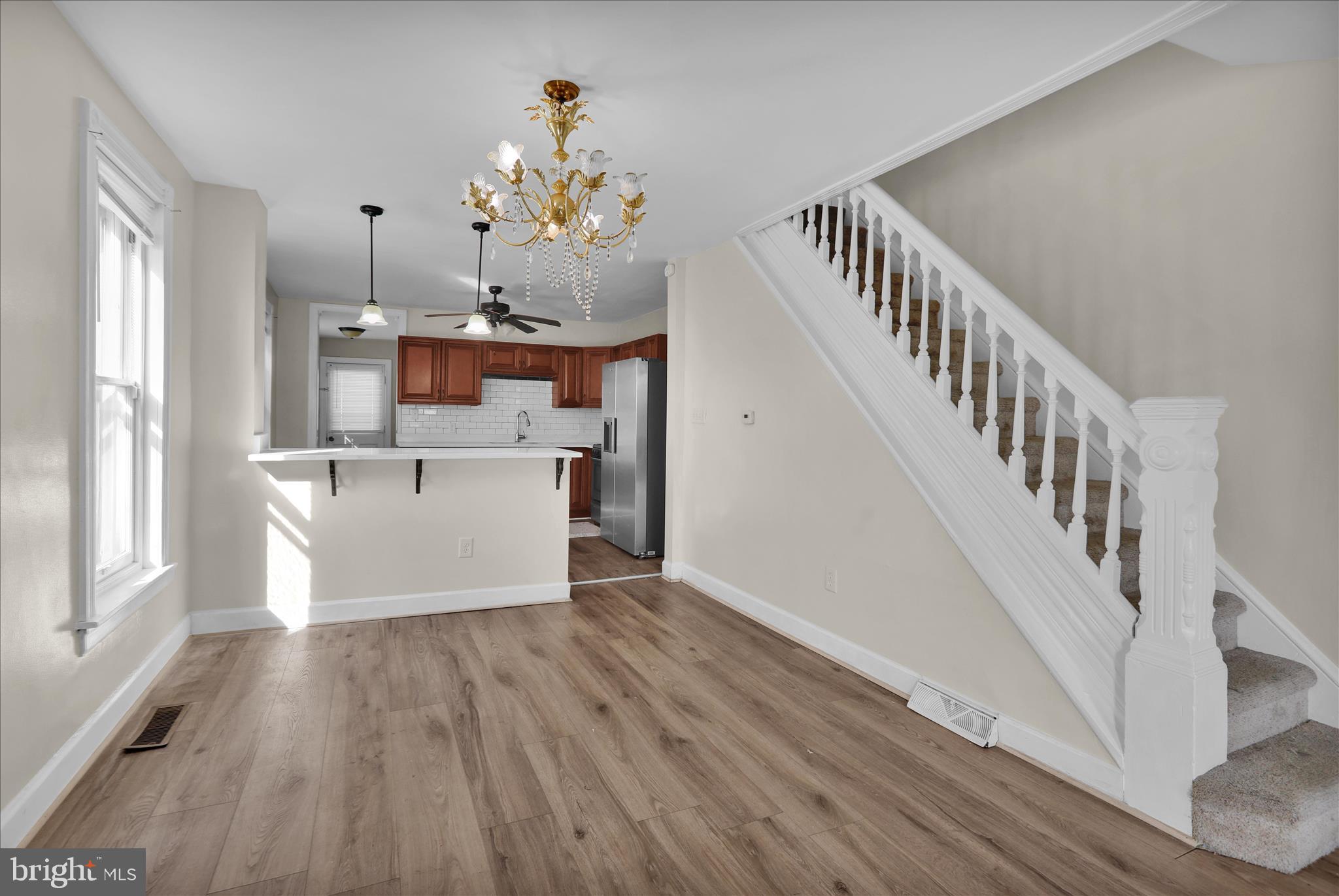 715 Mount Laurel Road Temple, PA 19560 - Photo 4 of 24 a view of a room with wooden floor and staircase