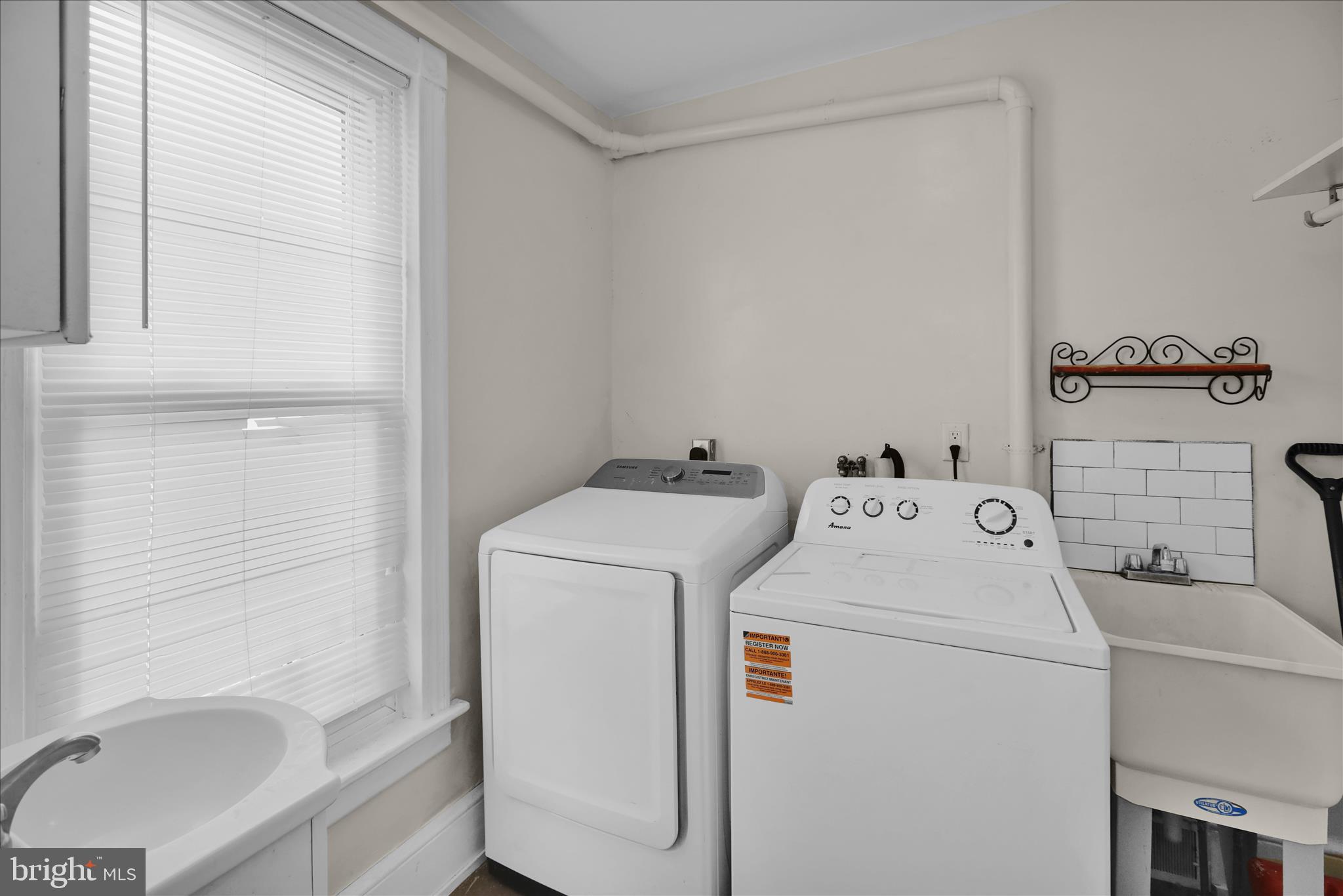 715 Mount Laurel Road Temple, PA 19560 - Photo 10 of 24 a utility room with dryer and washer