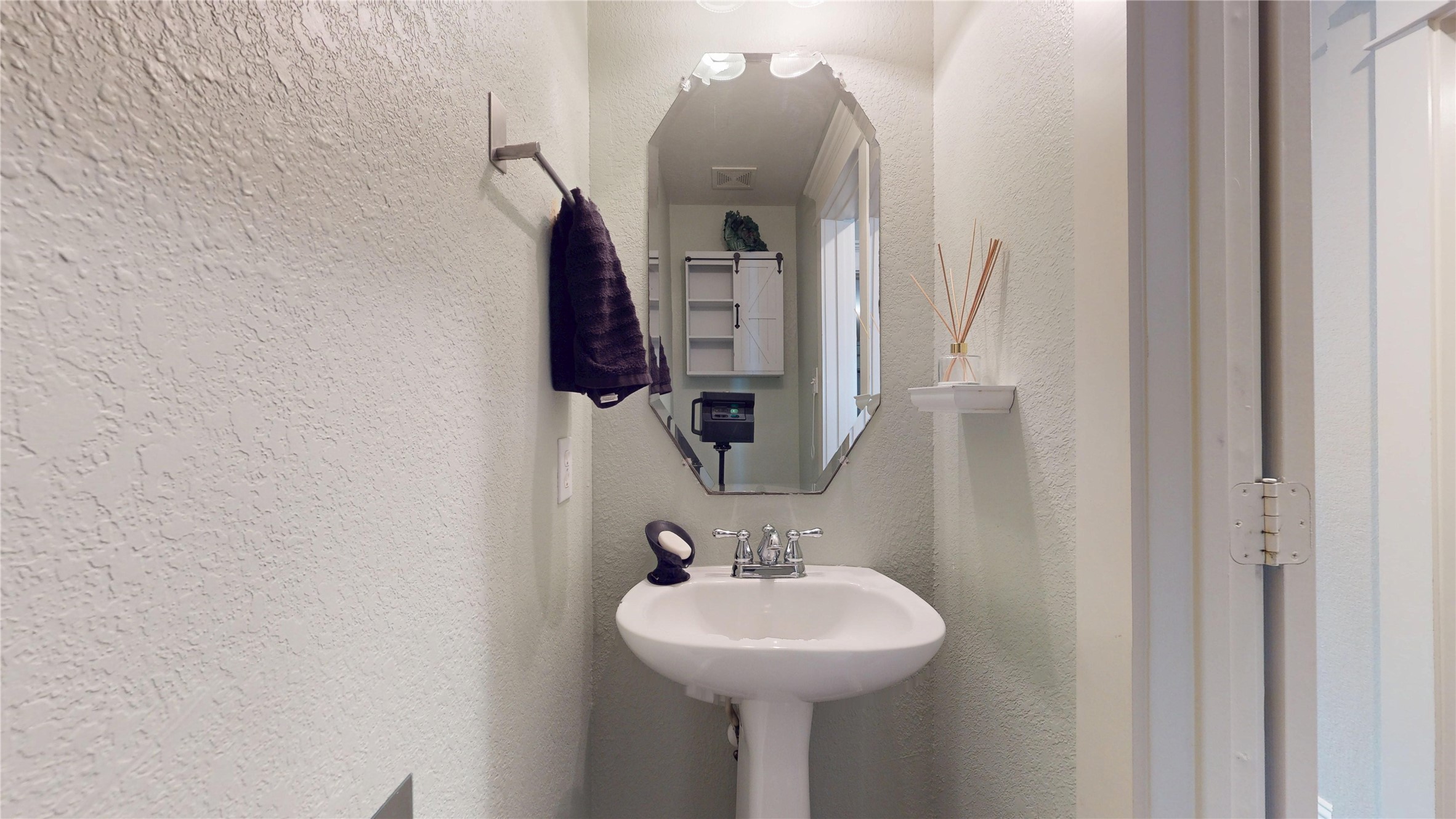 7918 Tupper Bend Court Cypress, TX 77433 - Photo 20 of 49 a bathroom with a sink and a mirror
