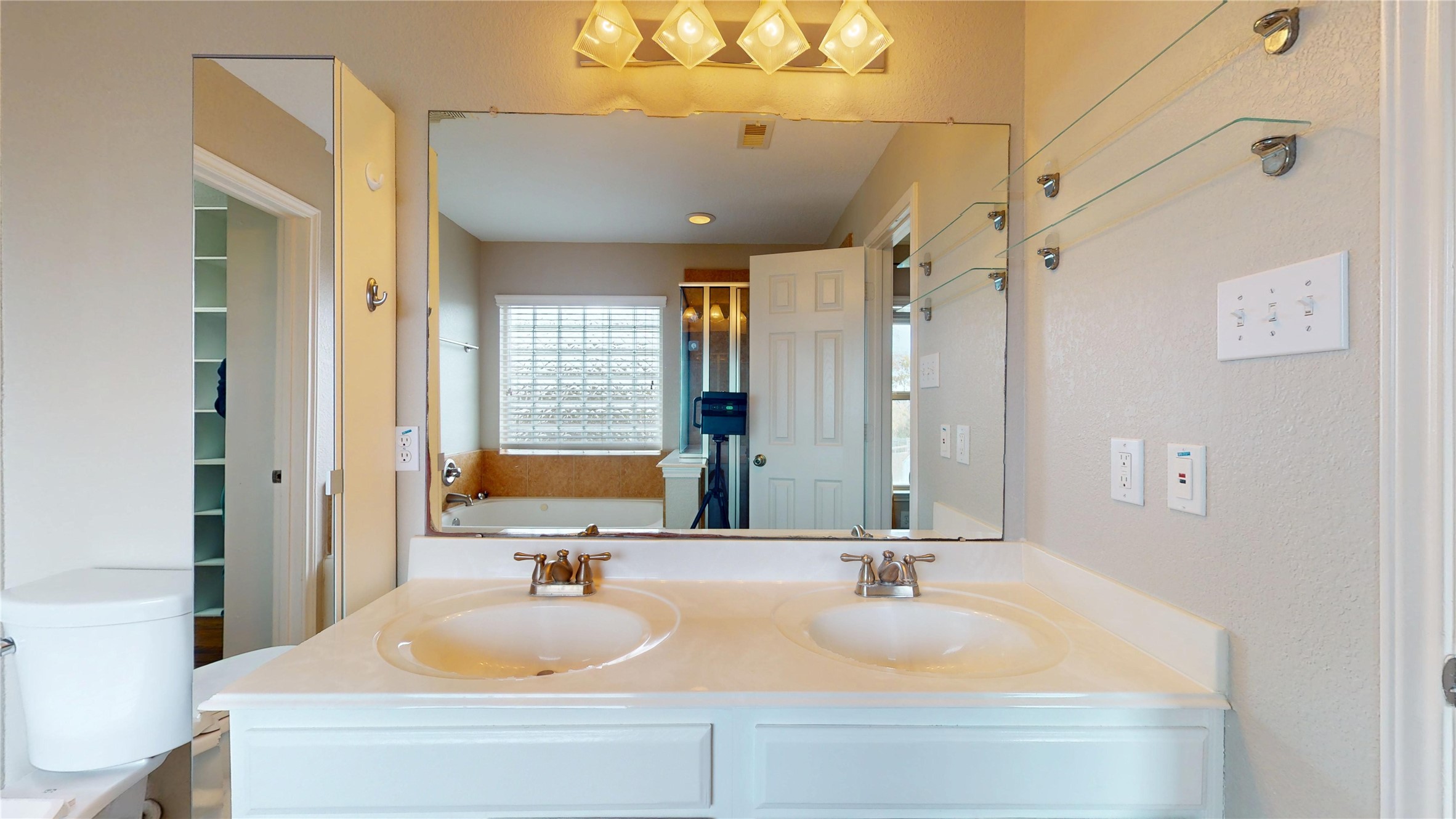 7918 Tupper Bend Court Cypress, TX 77433 - Photo 31 of 49 a bathroom with a bathtub and a sink