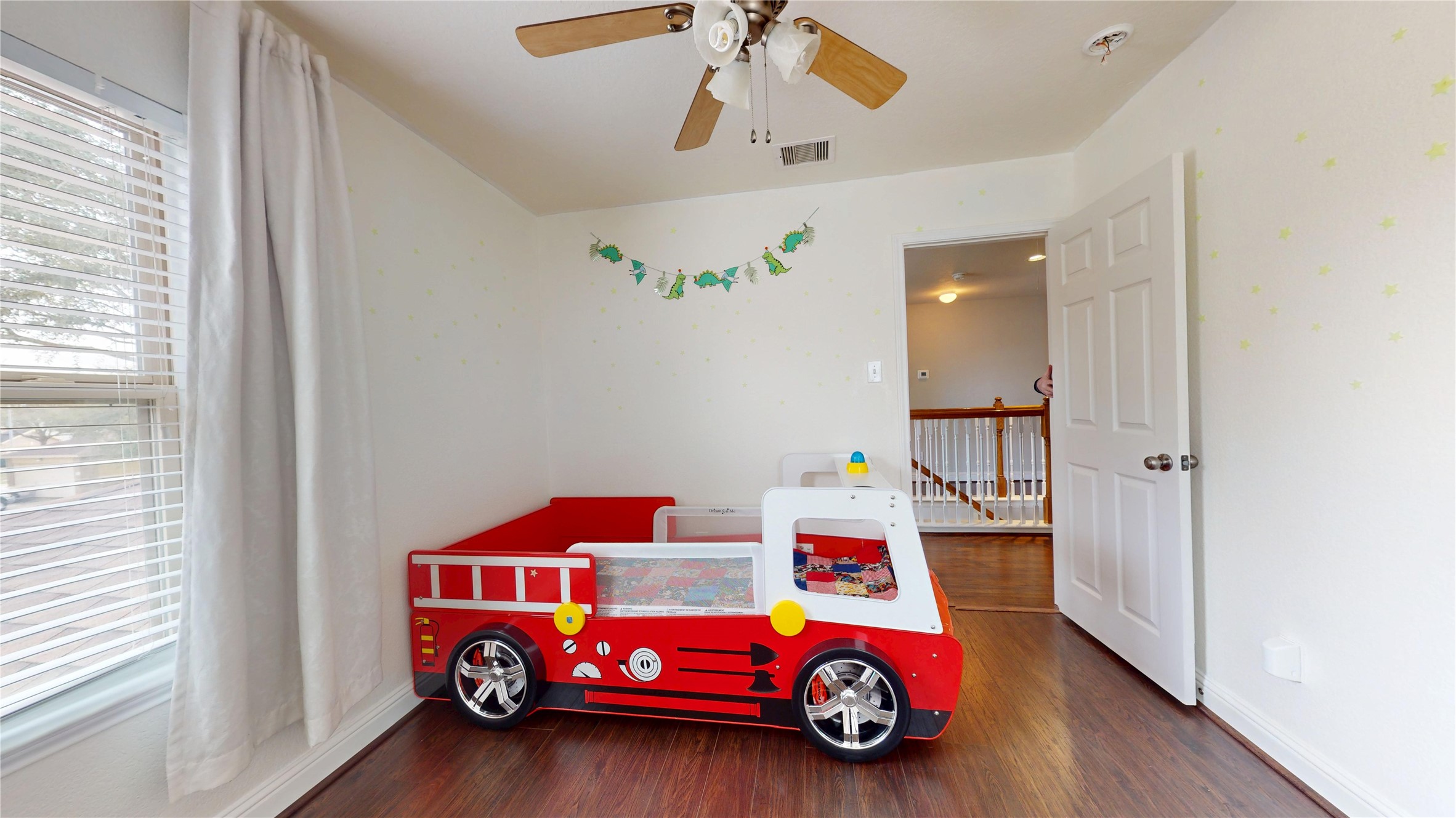 7918 Tupper Bend Court Cypress, TX 77433 - Photo 35 of 49 a bedroom with bed and a window