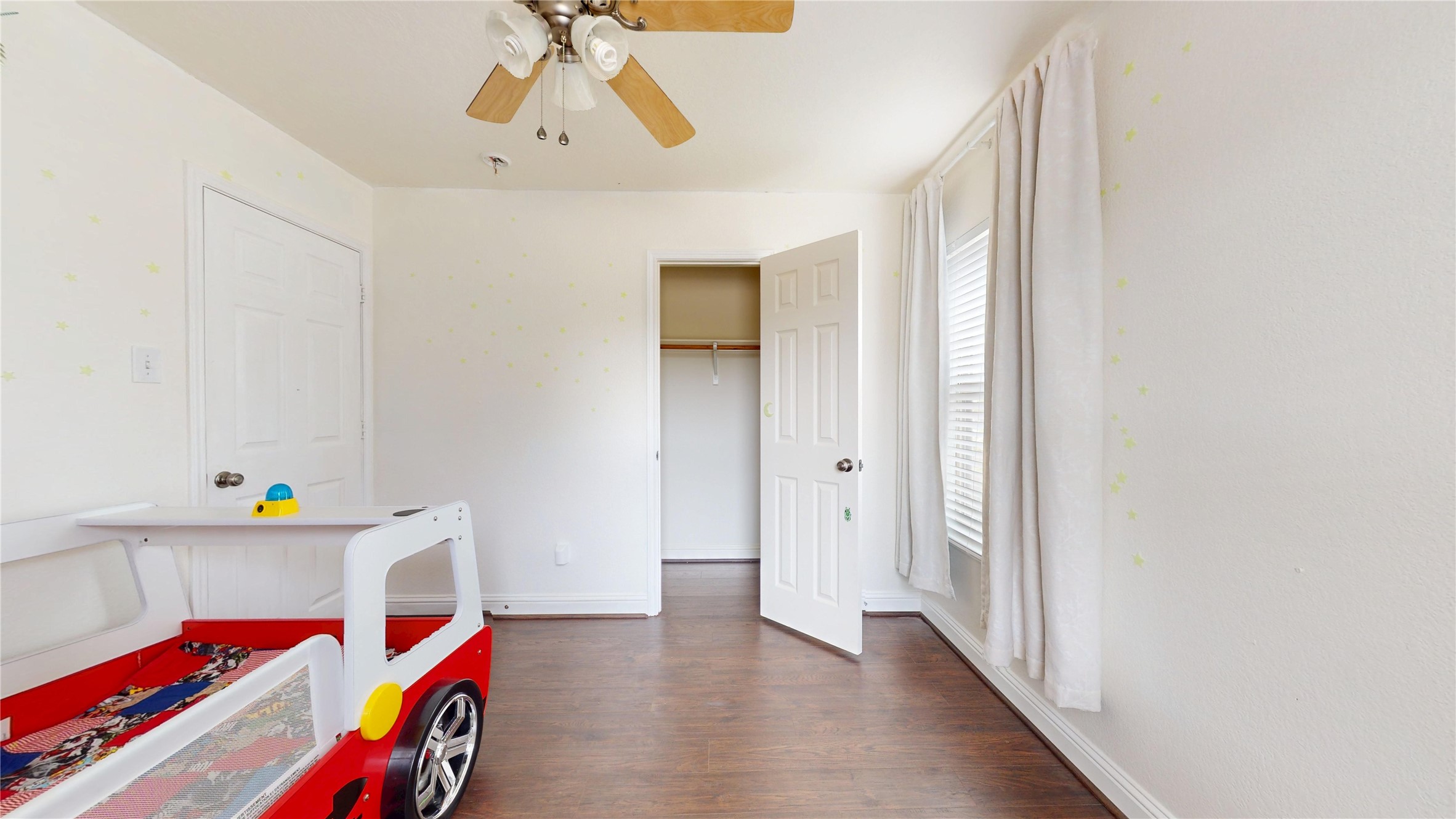7918 Tupper Bend Court Cypress, TX 77433 - Photo 36 of 49 a room that has a bed and a dresser in it
