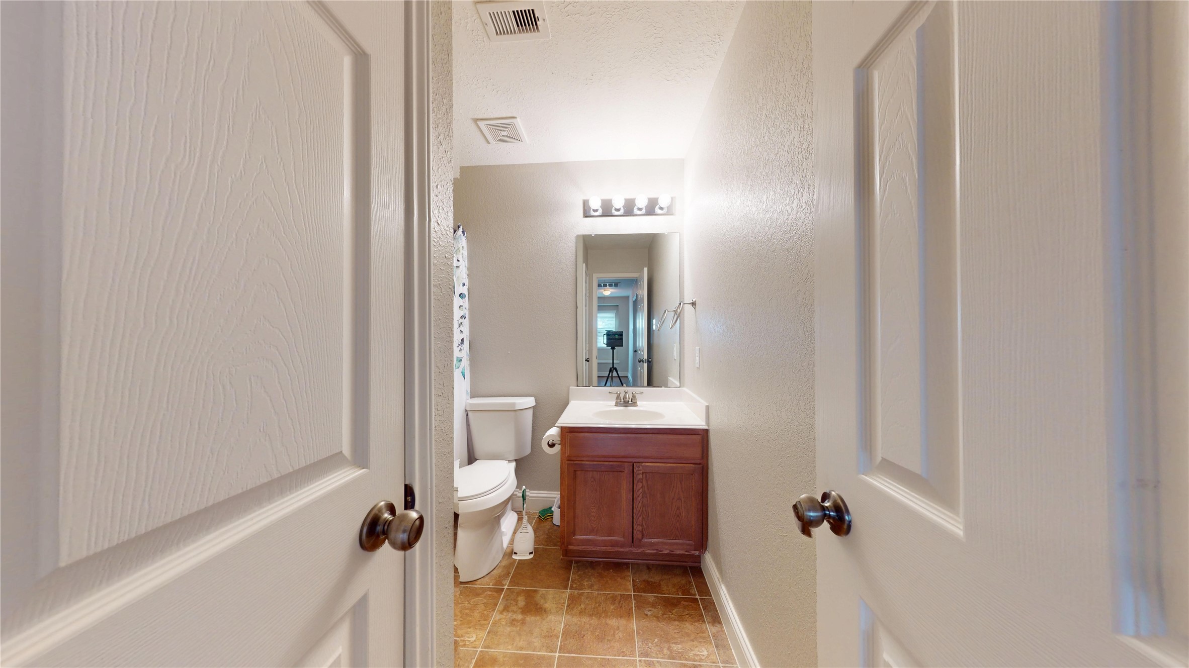 7918 Tupper Bend Court Cypress, TX 77433 - Photo 39 of 49 a bathroom with a sink toilet and shower