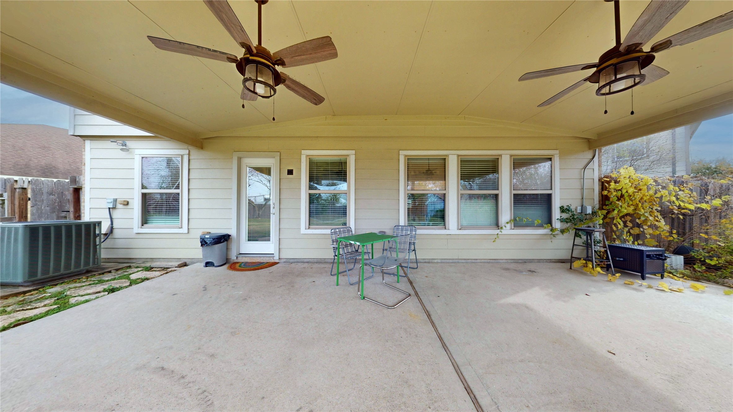 7918 Tupper Bend Court Cypress, TX 77433 - Photo 41 of 49 a man sitting on a bench in front of a building