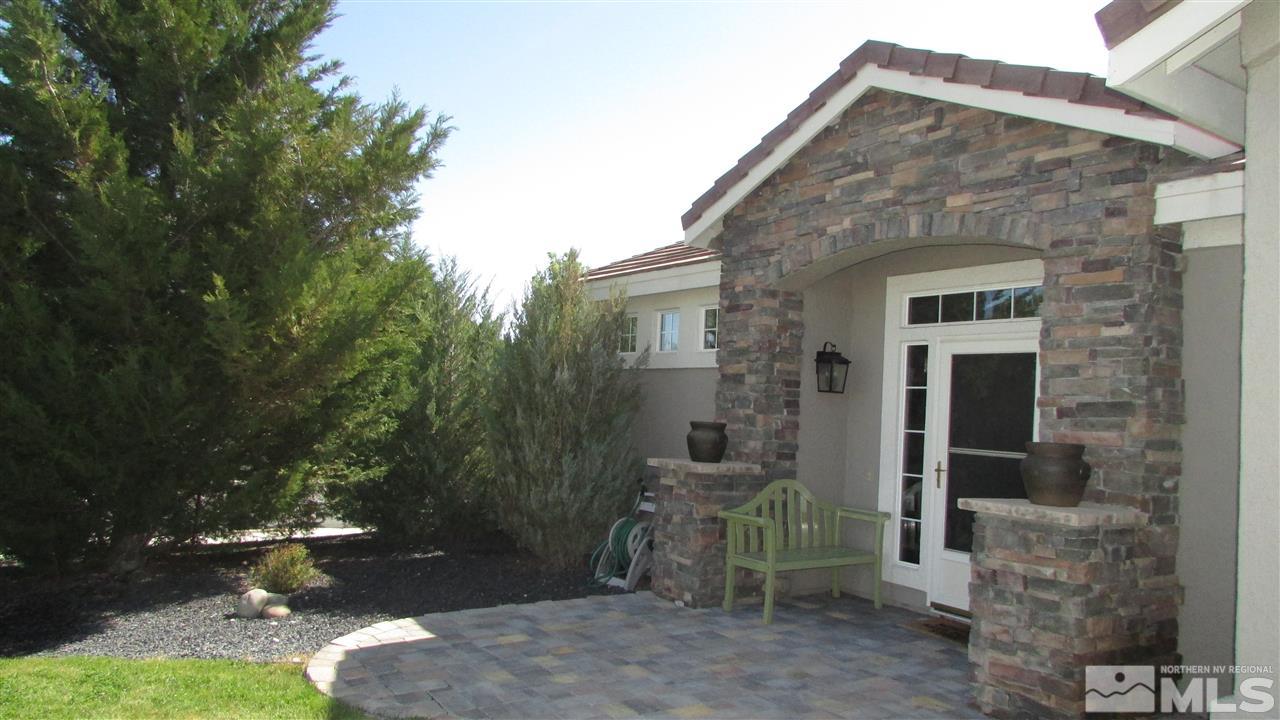 1426 Diamond Country Drive Reno, NV 89521 - Photo 1 of 1 a front view of a house with garden