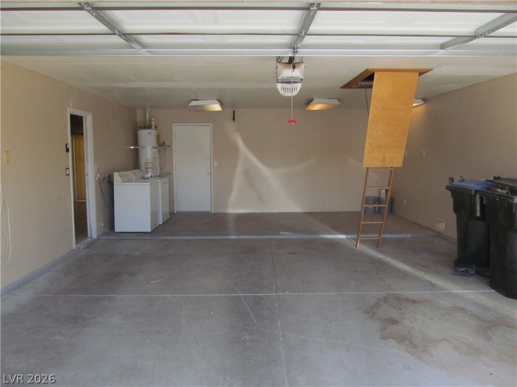 537 Longtree Avenue Henderson, NV 89011 - Photo 31 of 31 This spacious garage offers ample storage and convenient laundry facilities.