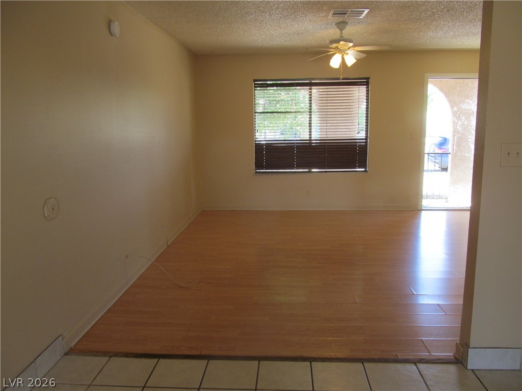537 Longtree Avenue Henderson, NV 89011 - Photo 4 of 31 This bright room features a warm wood floor and abundant natural light.