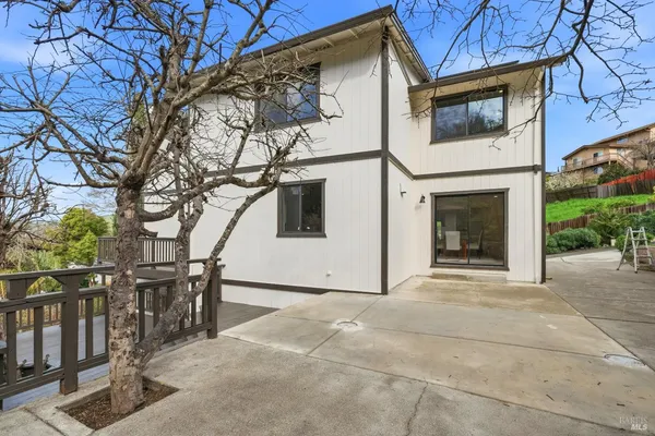 a view of a house with a patio