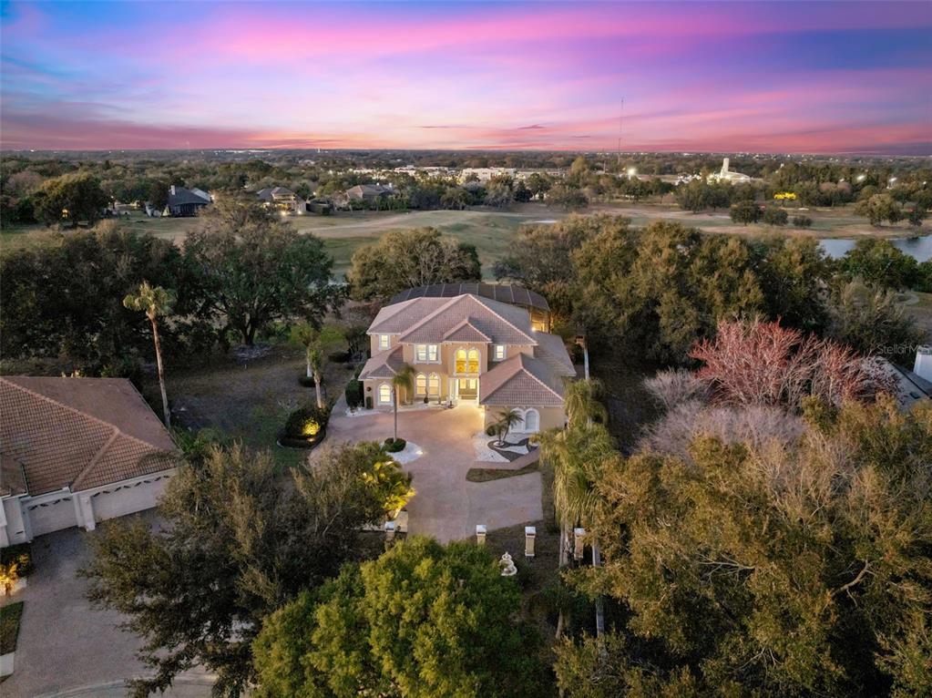 2500 St Ignatius Court Orlando, FL 32835 - Photo 1 of 71 an aerial view of a house with a lake view
