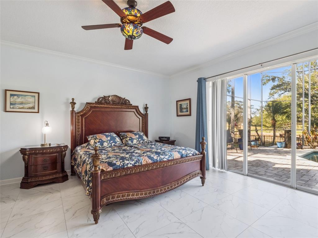 2500 St Ignatius Court Orlando, FL 32835 - Photo 25 of 71 a bedroom with a bed and window