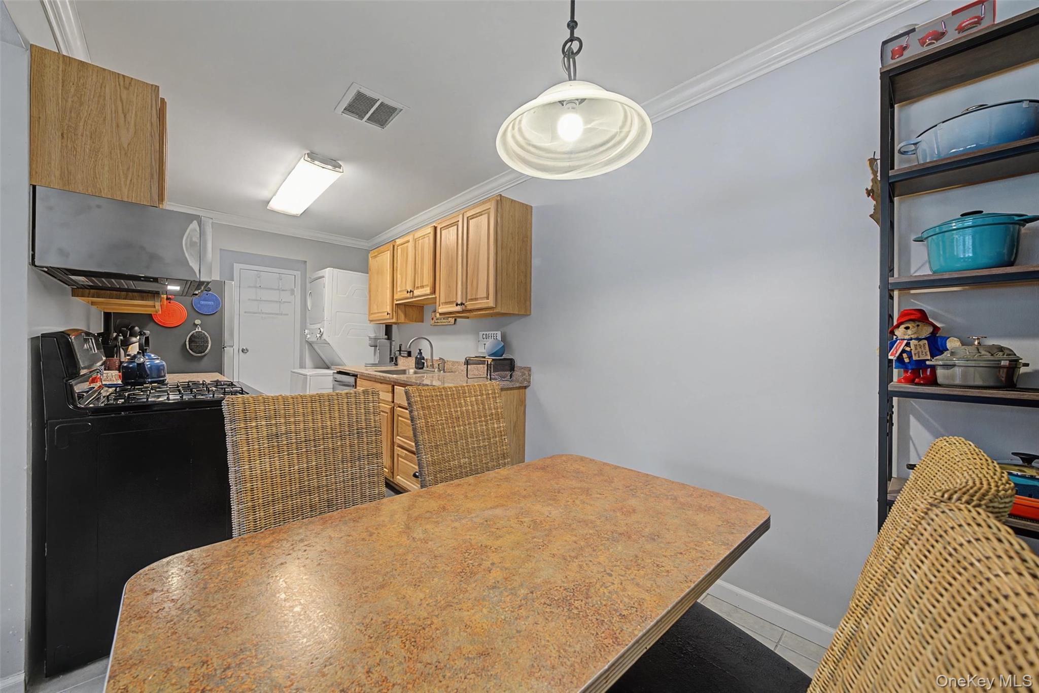 276 Temple Hill Road, Unit 1117 New Windsor, NY 12553 - Photo 11 of 24 a kitchen with cabinets and window