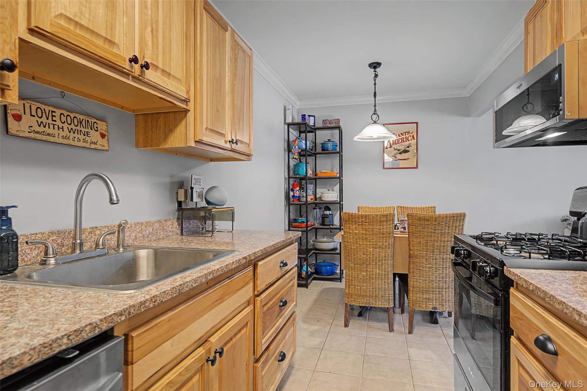 276 Temple Hill Road, Unit 1117 New Windsor, NY 12553 - Photo 15 of 24 a kitchen with refrigerator and cabinets