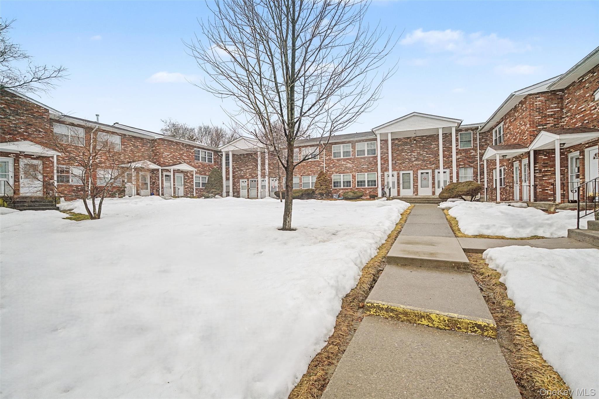 276 Temple Hill Road, Unit 1117 New Windsor, NY 12553 - Photo 2 of 24 a street view with residential house