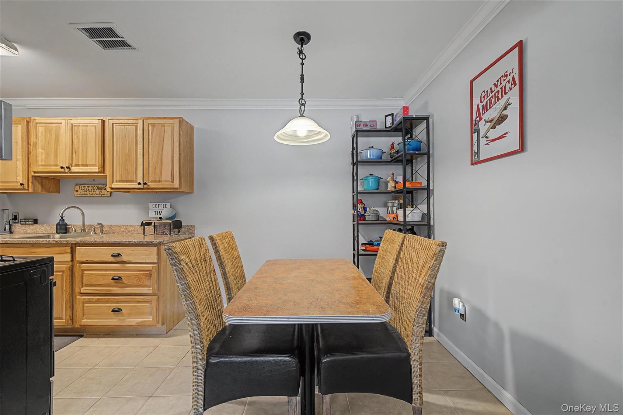 276 Temple Hill Road, Unit 1117 New Windsor, NY 12553 - Photo 8 of 24 a dining room with furniture and window
