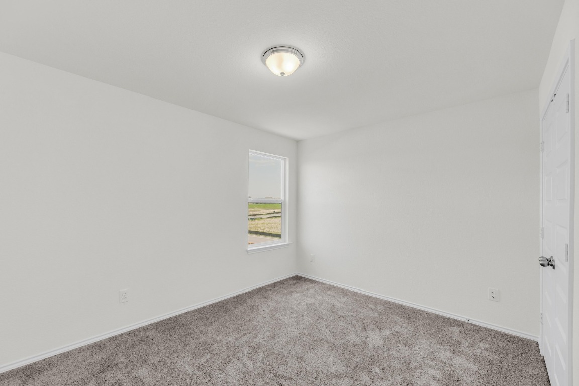 200 Lucky Texan Road Jarrell, TX 76537 - Photo 24 of 34 a view of an empty room and a window