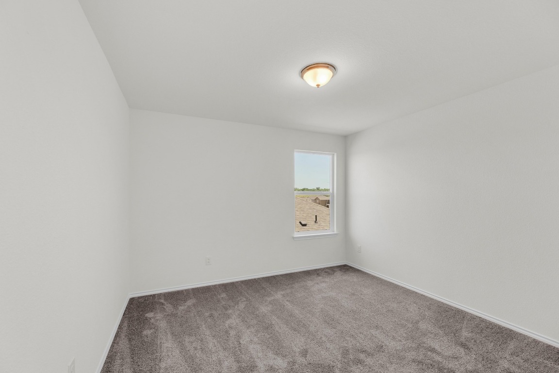 200 Lucky Texan Road Jarrell, TX 76537 - Photo 26 of 34 an empty room with windows