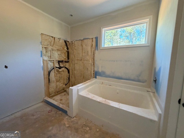248 Robert Williams Road Pine Mountain, GA 31822 - Photo 30 of 46 a bathroom with a tub and a shower