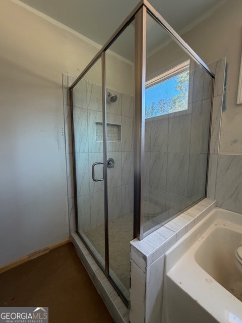 248 Robert Williams Road Pine Mountain, GA 31822 - Photo 31 of 46 a bathroom with a bathtub and shower