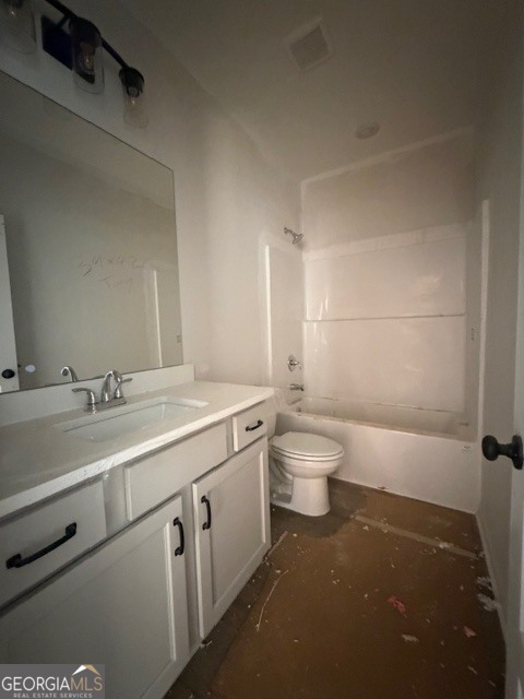 248 Robert Williams Road Pine Mountain, GA 31822 - Photo 32 of 46 a bathroom with a double vanity sink toilet and a mirror