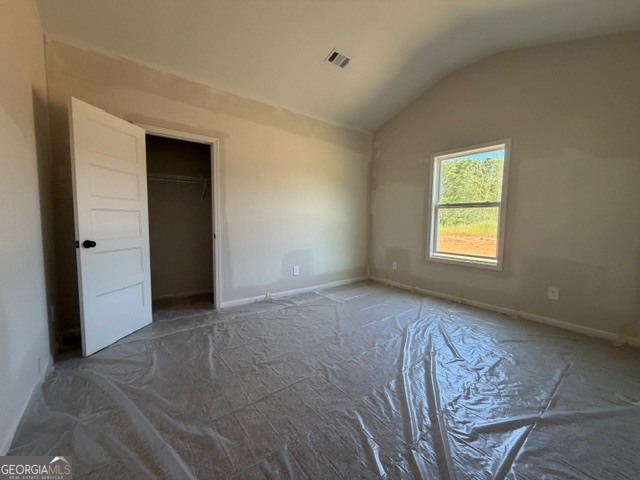 248 Robert Williams Road Pine Mountain, GA 31822 - Photo 38 of 46 a view of an empty room with window and wooden floor