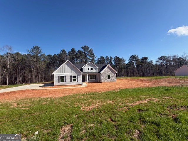 248 Robert Williams Road Pine Mountain, GA 31822 - Photo 46 of 46 a front view of a house with a yard and trees