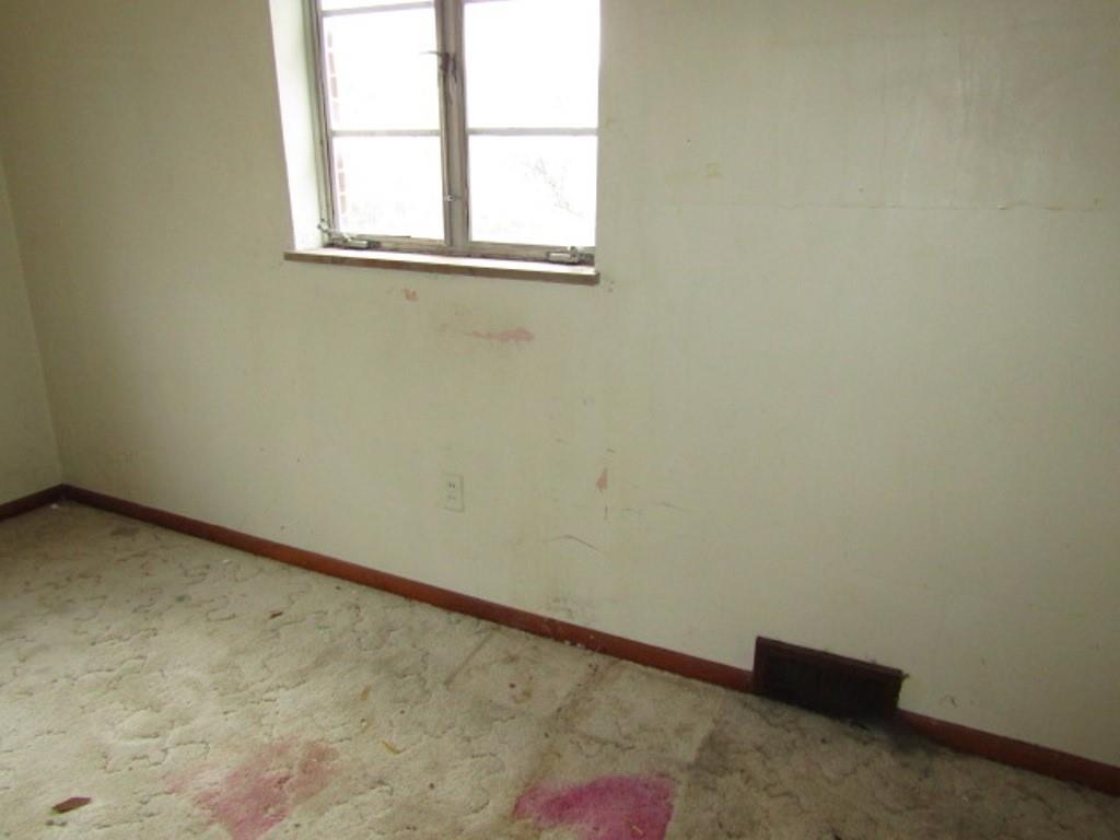 1353 Front Street Crescent, PA 15046 - Photo 13 of 22 an empty room with a window