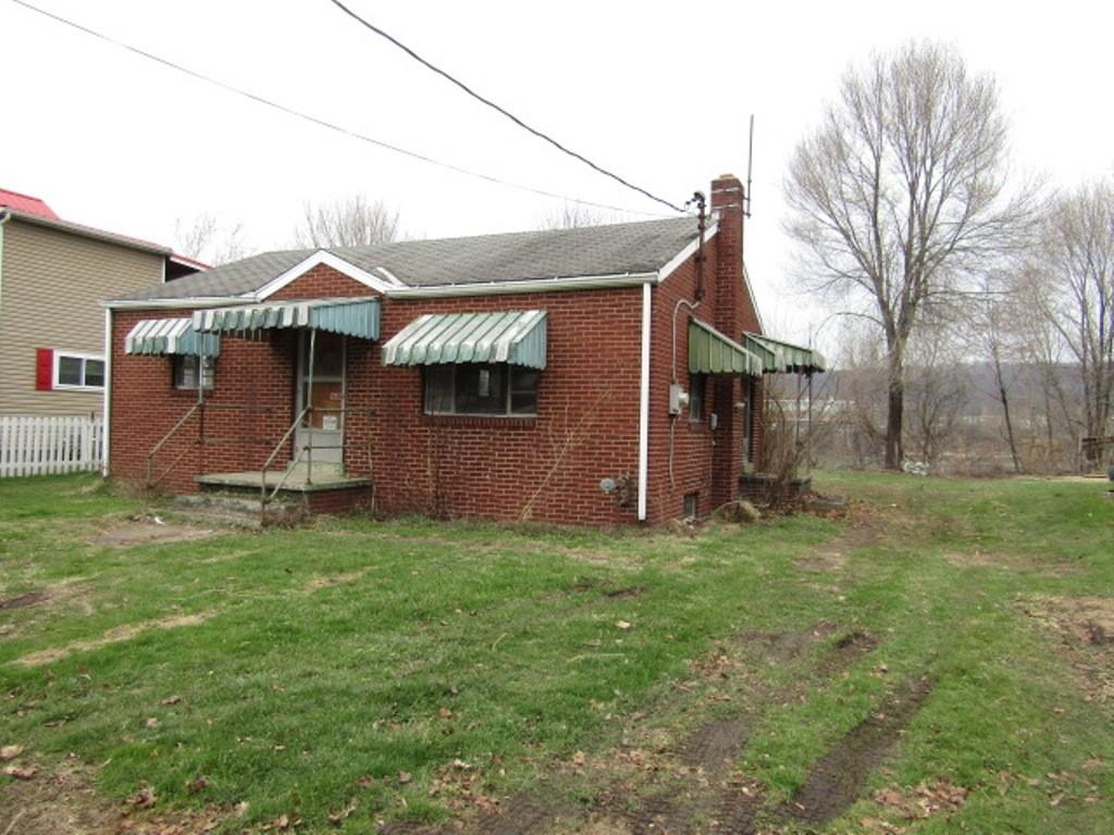 1353 Front Street Crescent, PA 15046 - Photo 3 of 22 a view of a house with a backyard