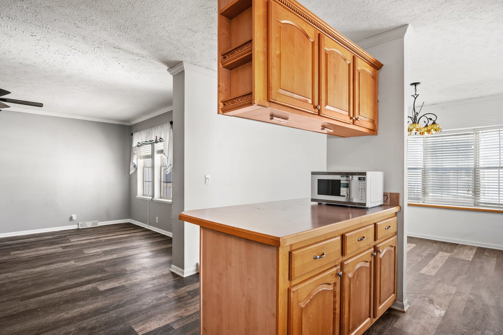 1119 Lakewood Road Elgin, IL 60123 - Photo 14 of 24 a kitchen with stainless steel appliances granite countertop a stove and a sink