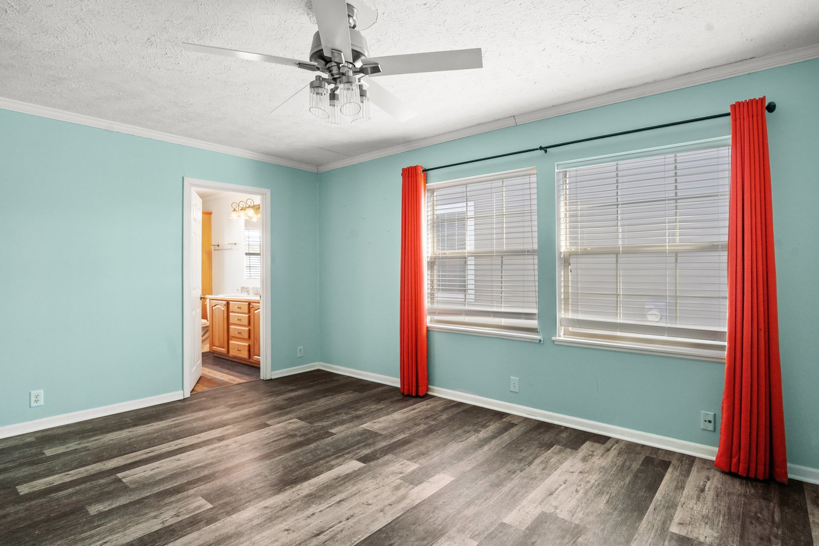 1119 Lakewood Road Elgin, IL 60123 - Photo 15 of 24 an empty room with wooden floor and windows