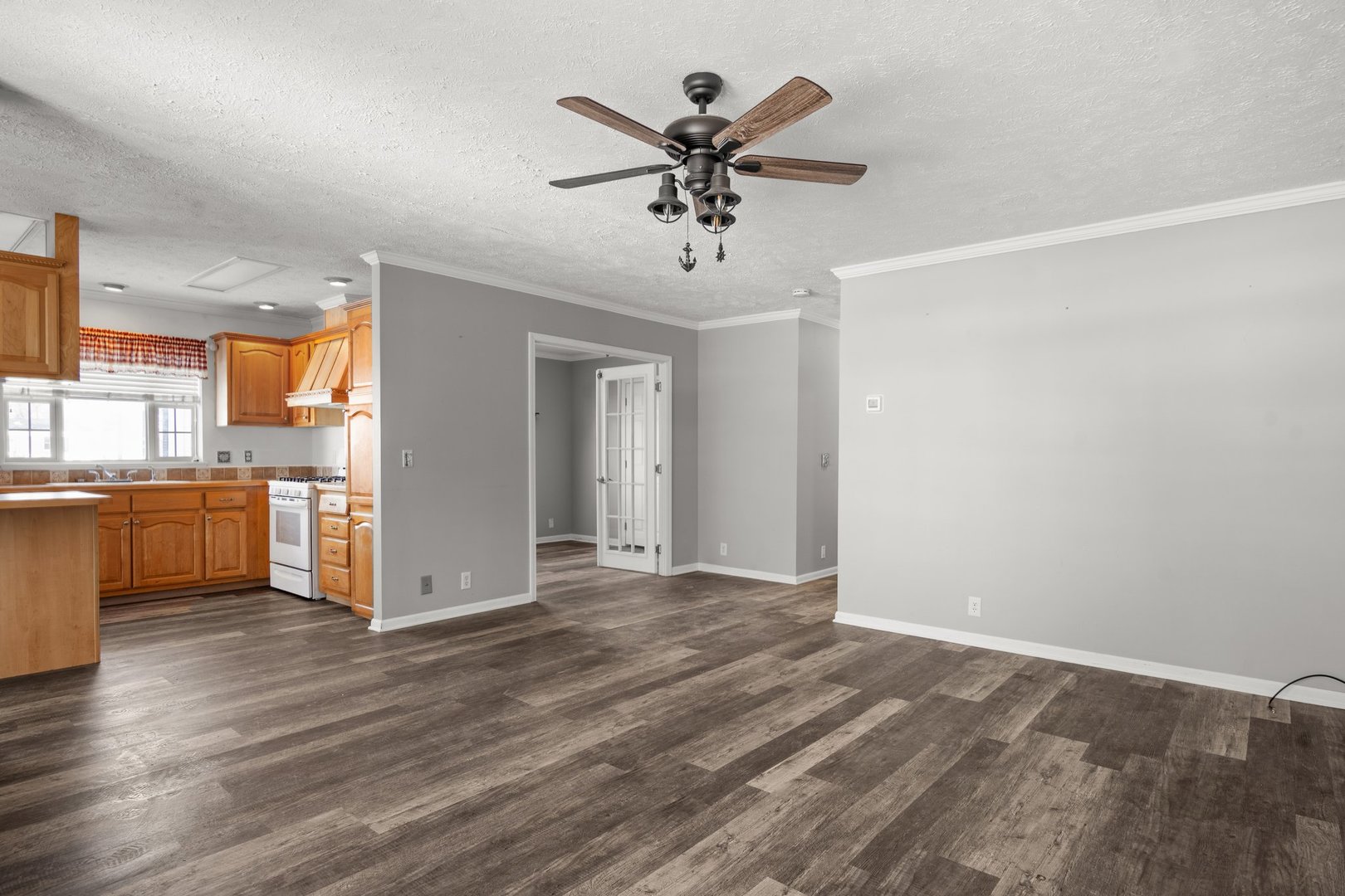 1119 Lakewood Road Elgin, IL 60123 - Photo 6 of 24 a view of a kitchen with a sink and a refrigerator