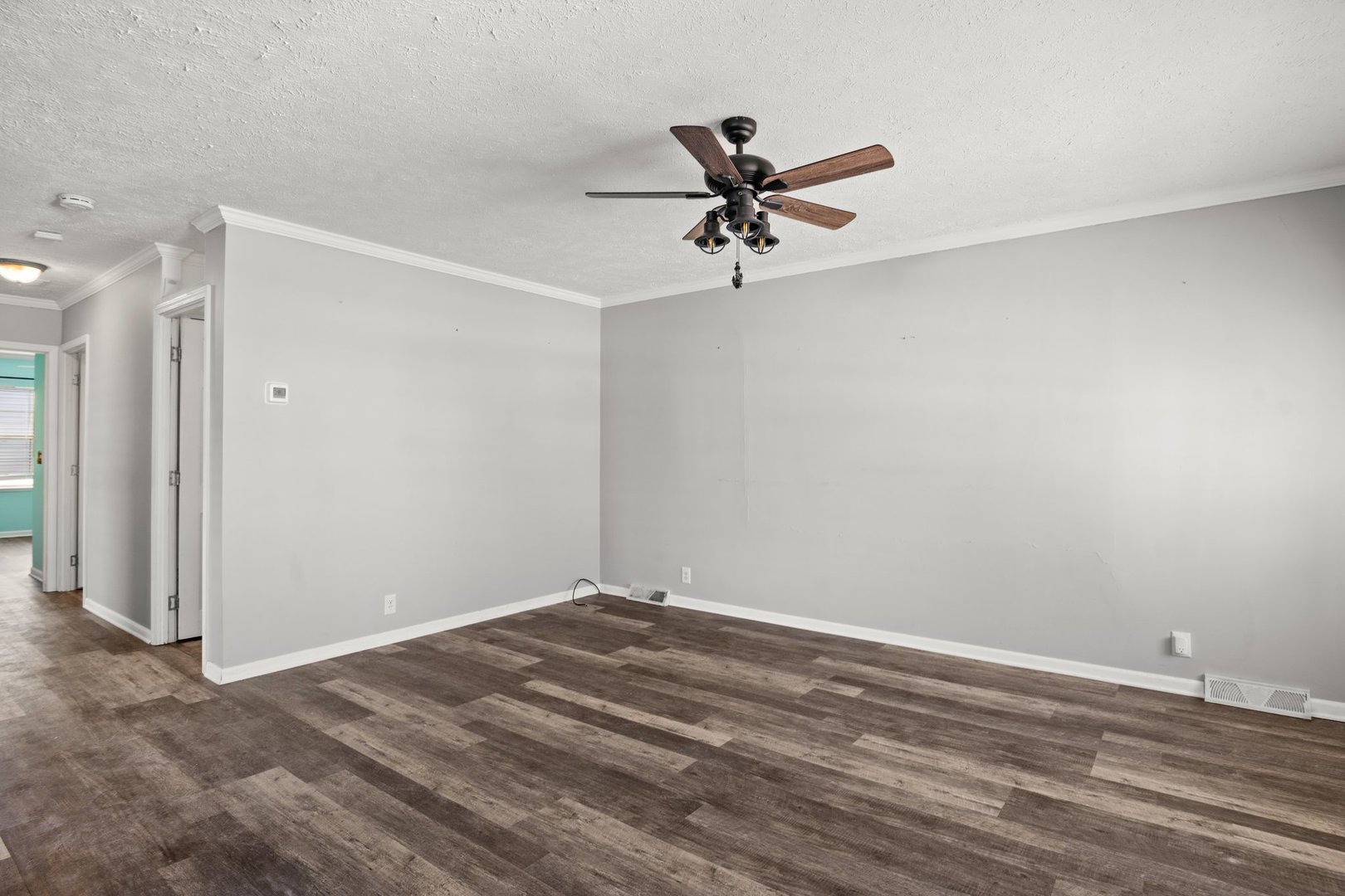 1119 Lakewood Road Elgin, IL 60123 - Photo 7 of 24 a view of a big room with wooden floor
