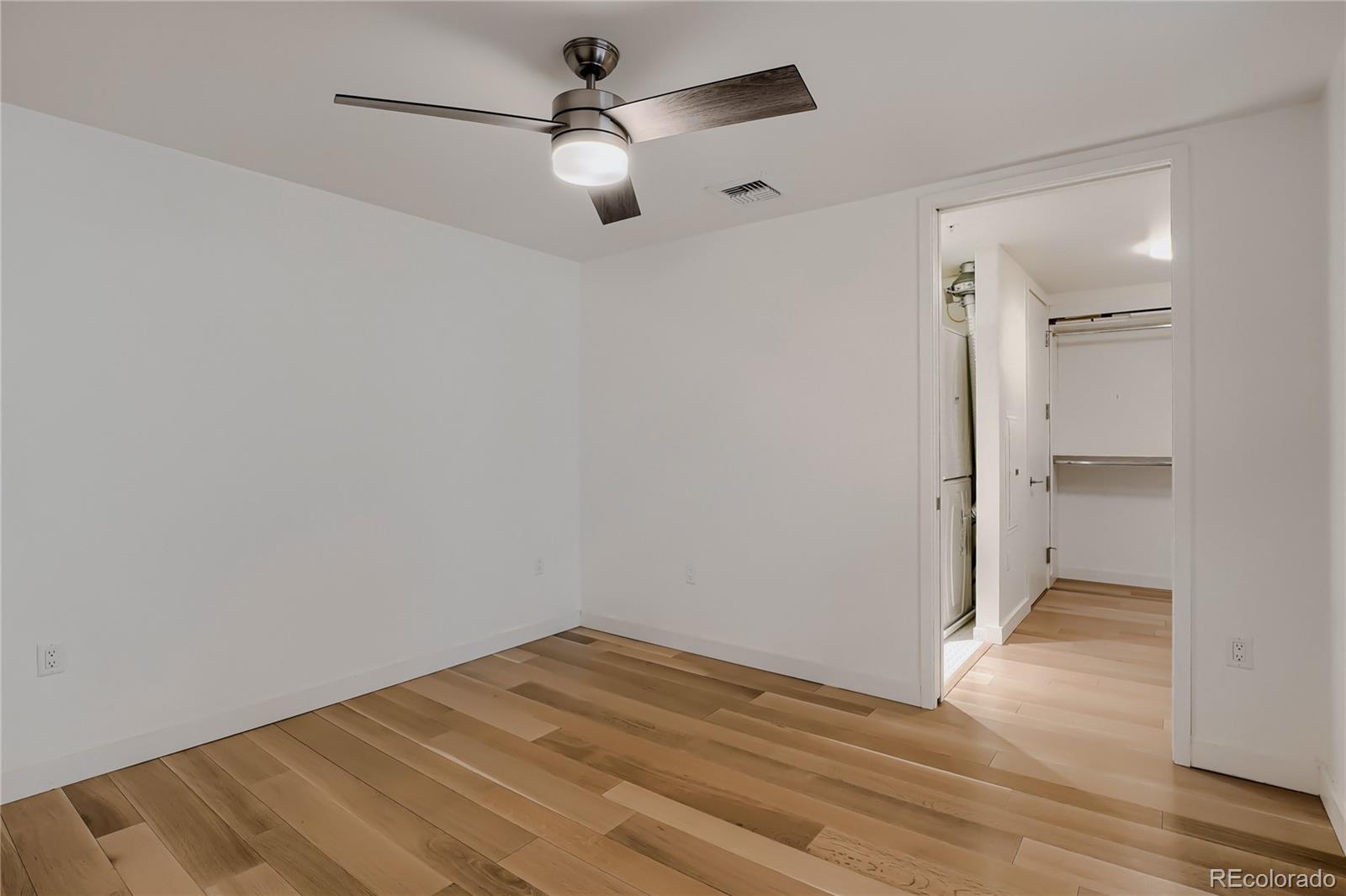 1750 Wewatta Street, Unit 403 Denver, CO 80202 - Photo 15 of 40 wooden floor in an empty room