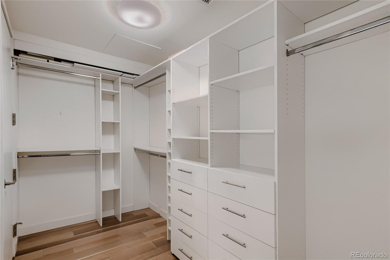 1750 Wewatta Street, Unit 403 Denver, CO 80202 - Photo 16 of 40 a view of an empty walk in closet