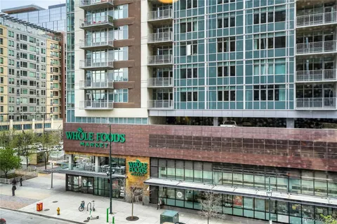 a view of city with tall buildings