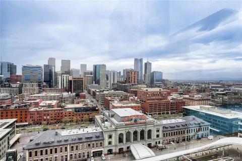 a view of a terrace with wooden benches