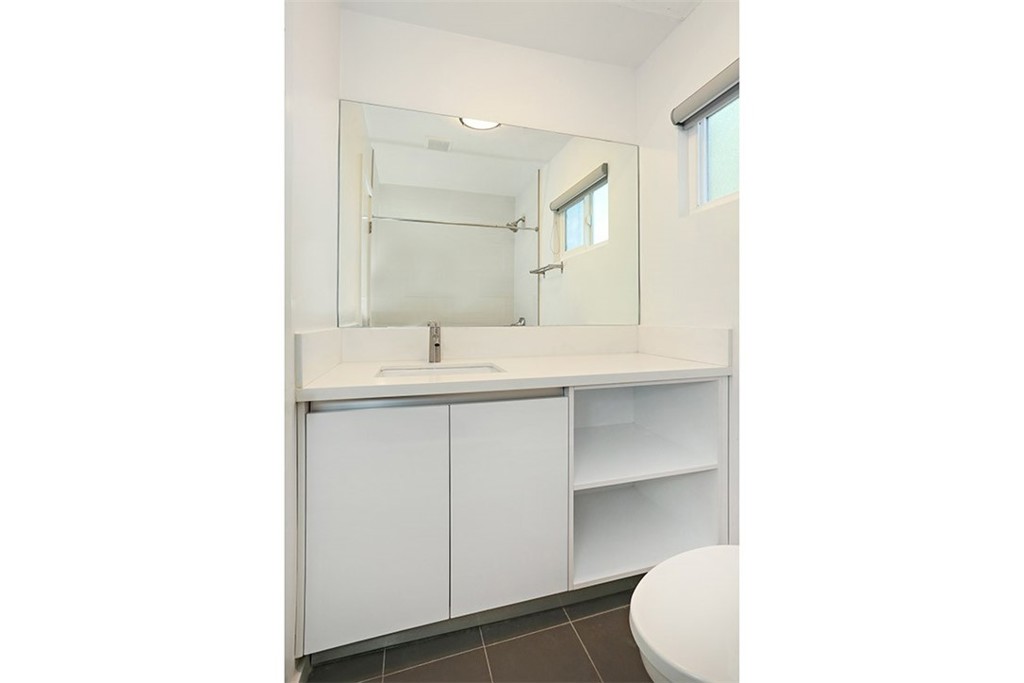 11918 Hart Street, Unit 1 North Hollywood, CA 91605 - Photo 5 of 6 a bathroom with a sink and a toilet