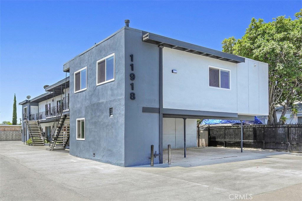 11918 Hart Street, Unit 1 North Hollywood, CA 91605 - Photo 6 of 6 a front view of a house with a garage