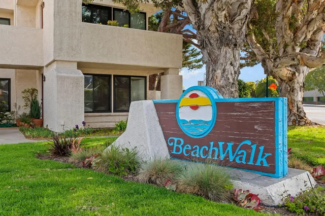 a view of outdoor space with sign board and garden