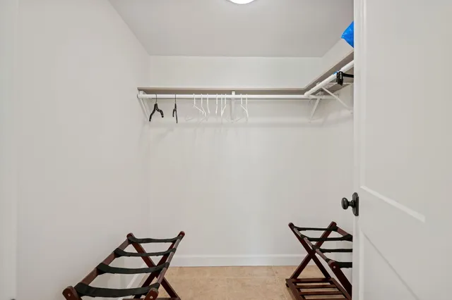 a view of room with racks on the wall