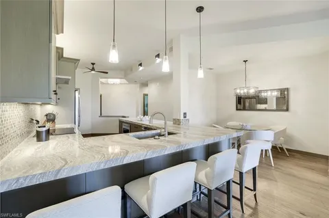 $1,495,000 | 7655 Pebble Creek Circle, Unit 404, Naples, FL 34108