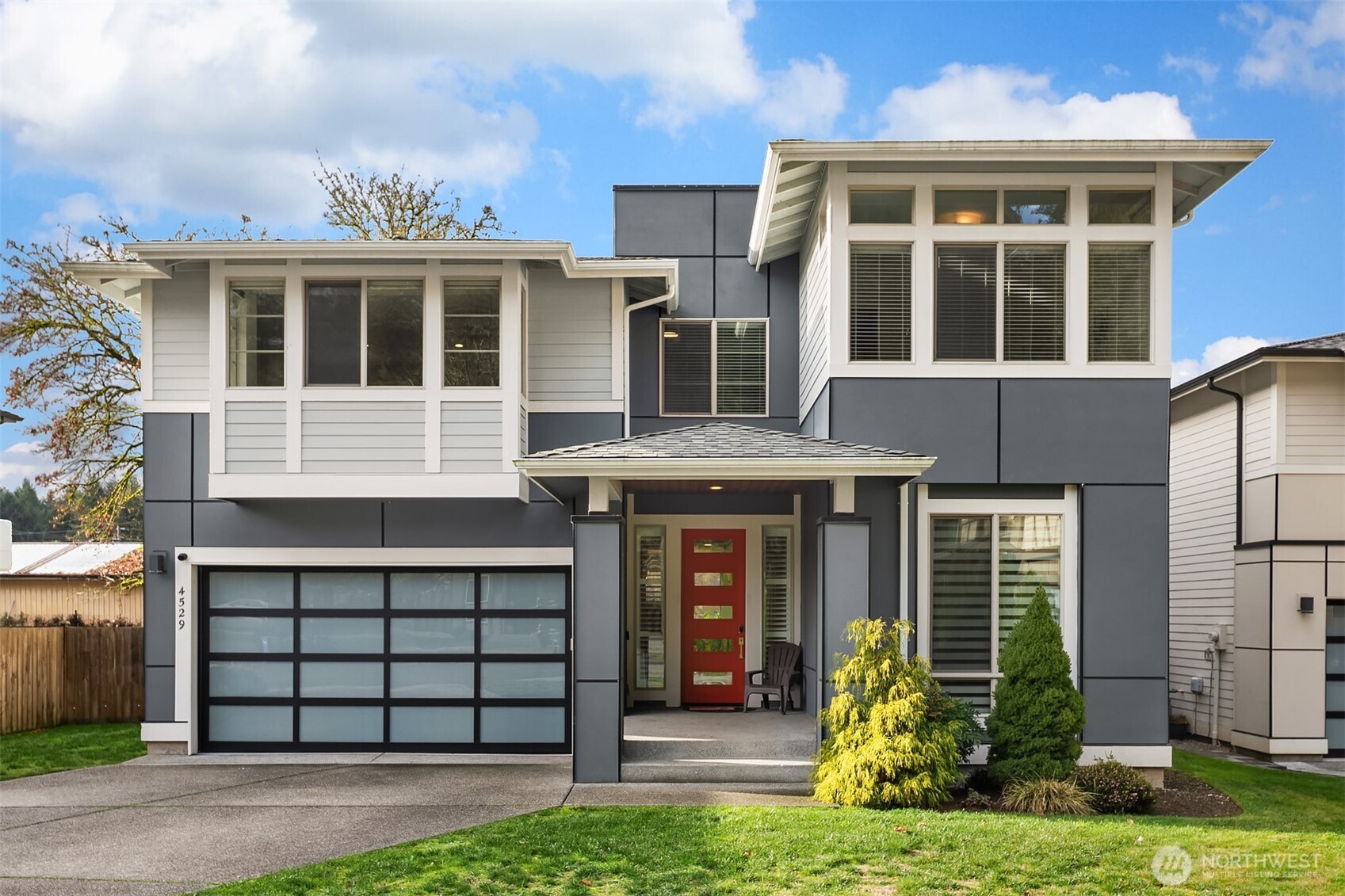 4529 327th Place Northeast Carnation, WA 98014 - Photo 1 of 27 a front view of a house with a yard