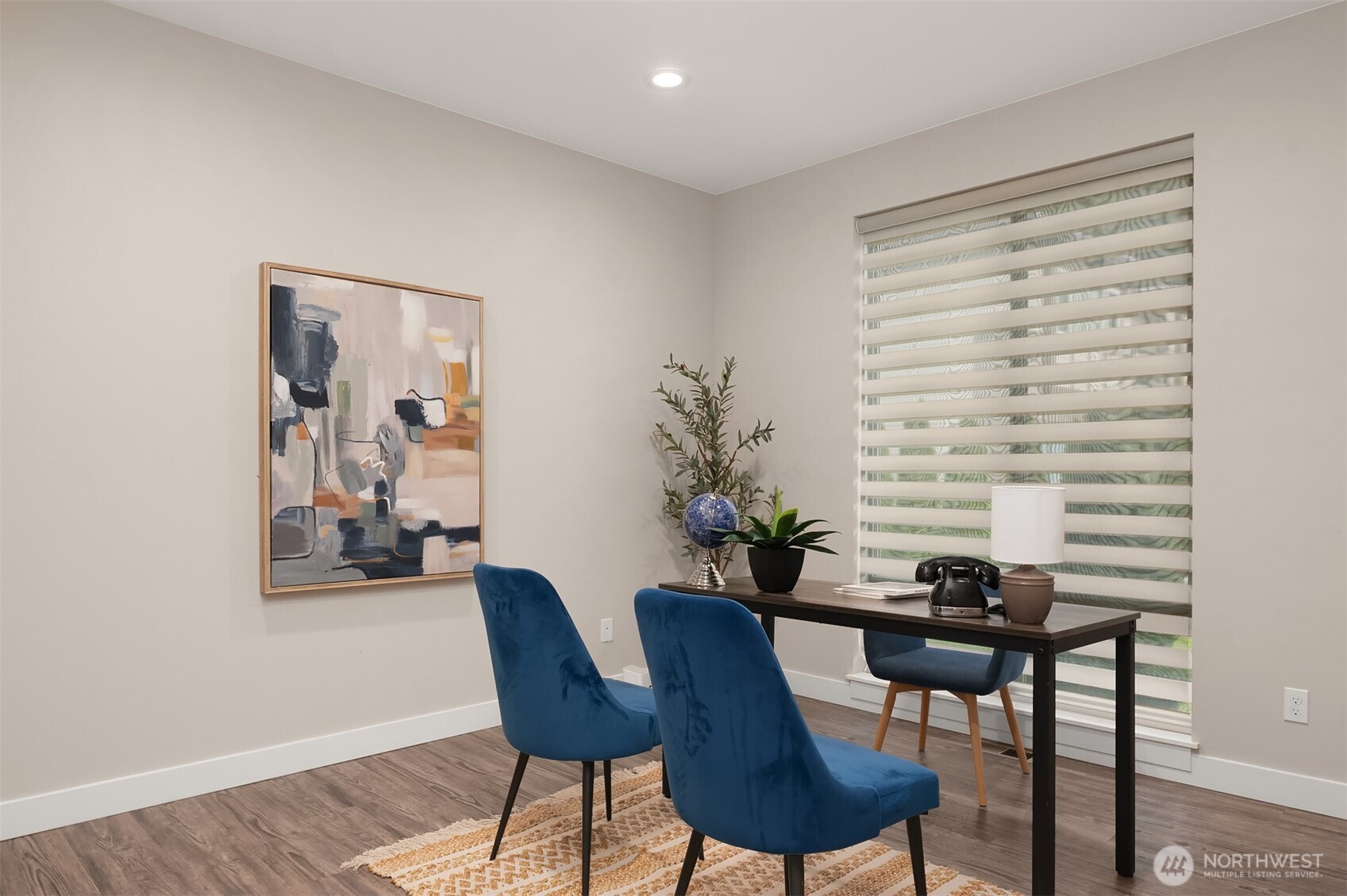 4529 327th Place Northeast Carnation, WA 98014 - Photo 11 of 27 a view of a livingroom with furniture and a potted plant
