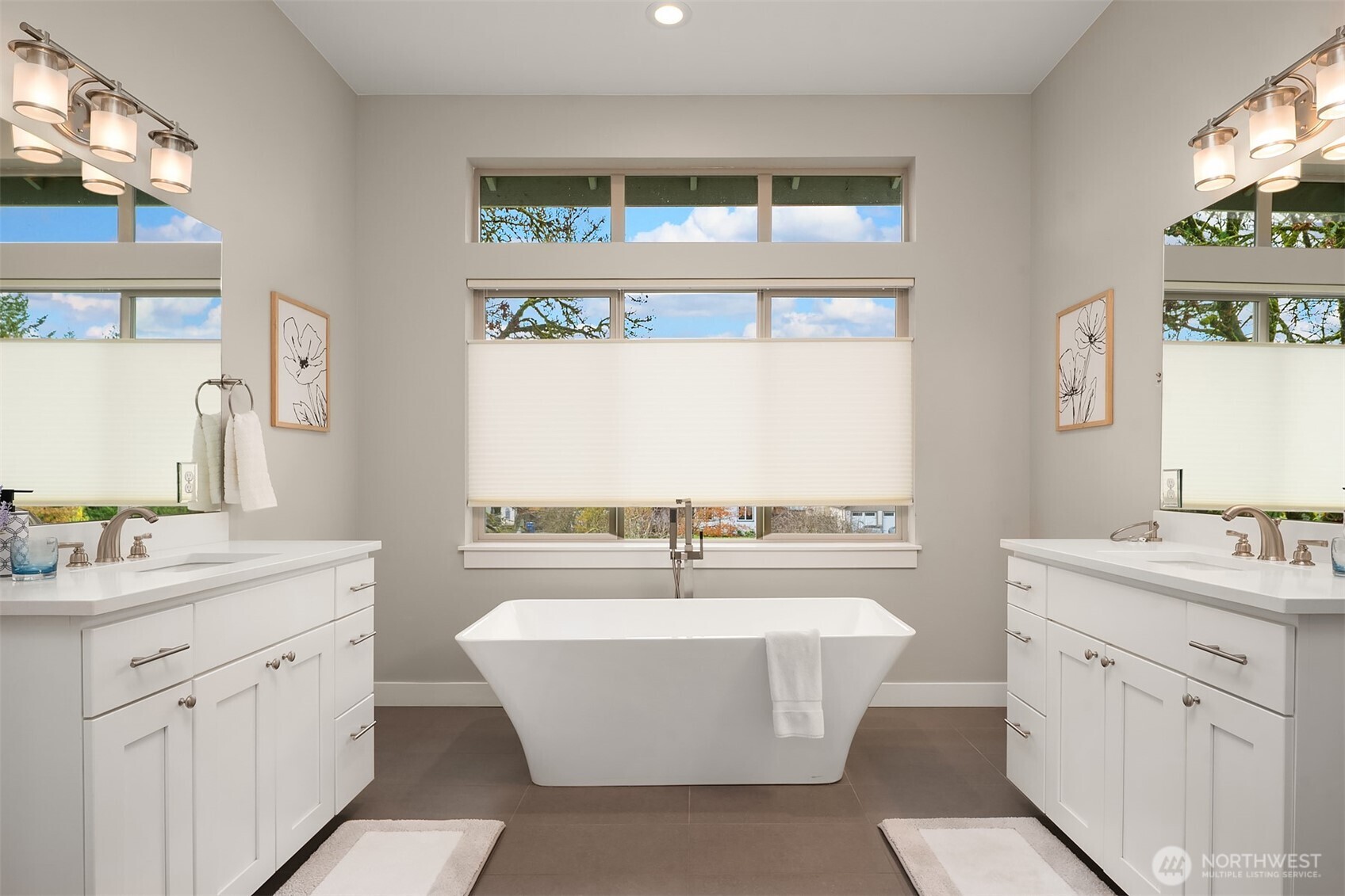 4529 327th Place Northeast Carnation, WA 98014 - Photo 14 of 27 a room with counter top space a sink a lamp a window and a shower