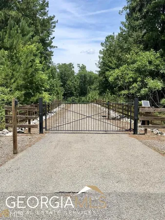 a view of a street with a building in the background
